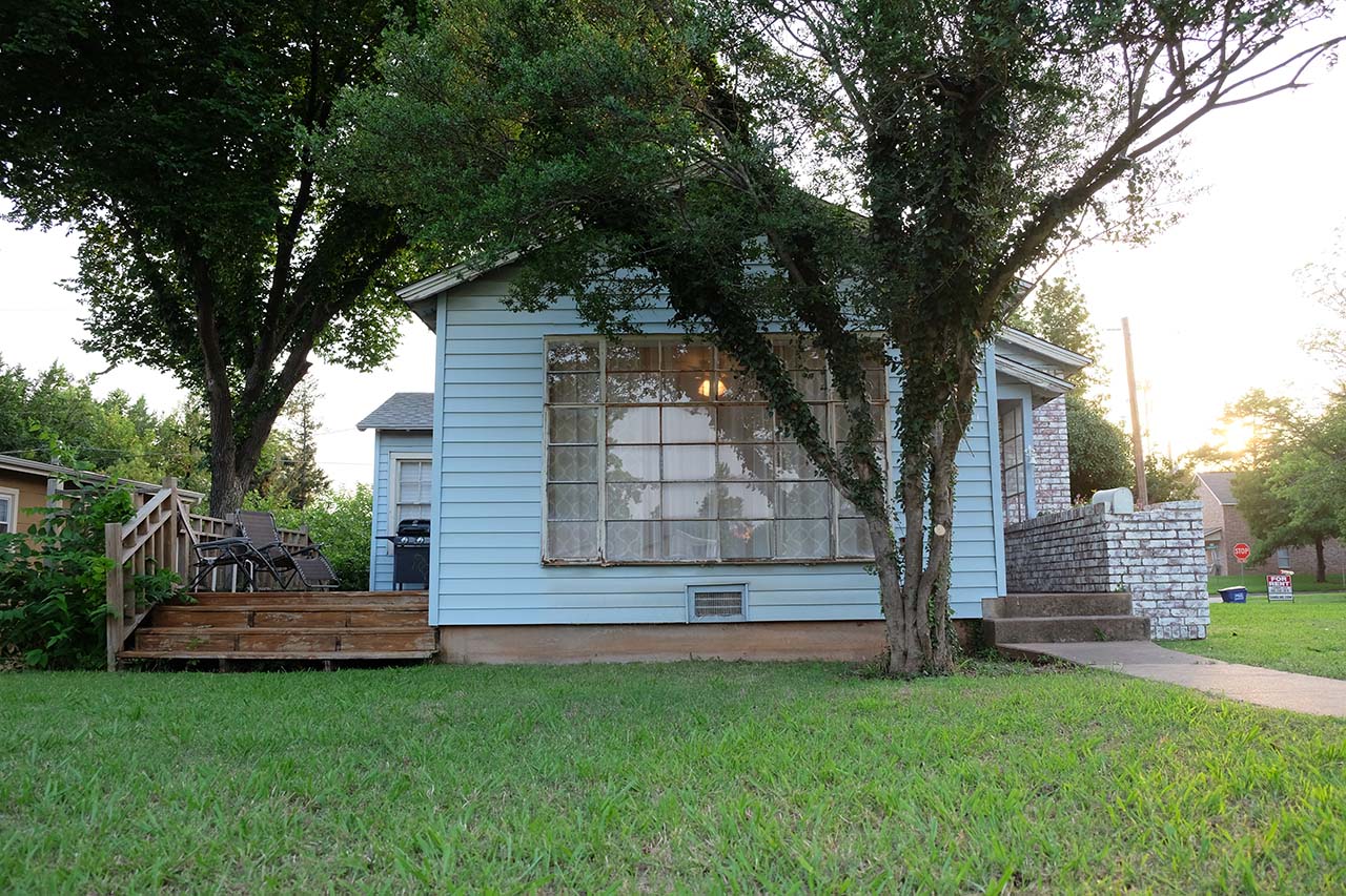 East Outside View of back deck and front door - 102 South Kings Rent House