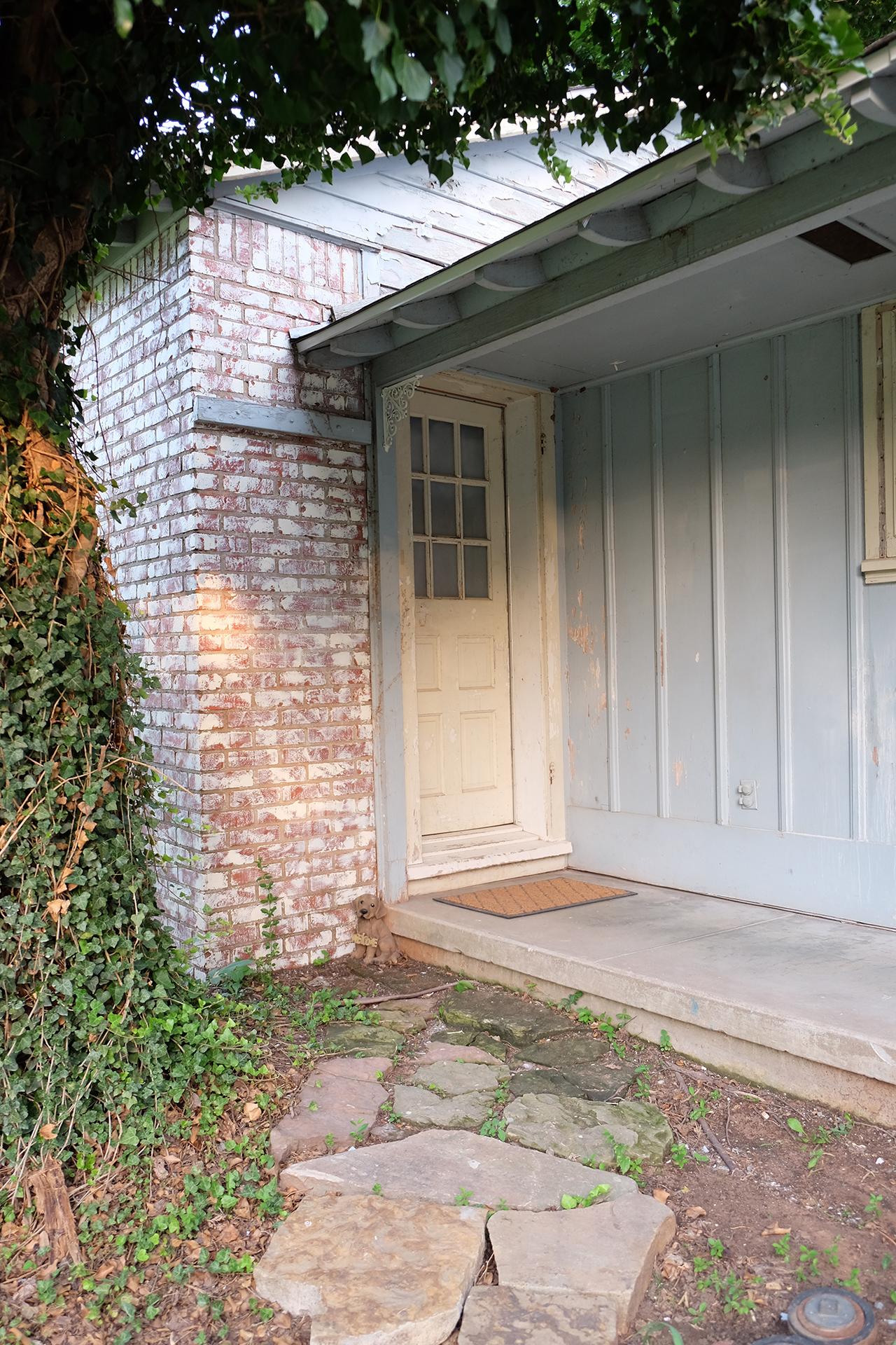 East Kitchen door on northside of house with covered porch - 102 South Kings Rent House