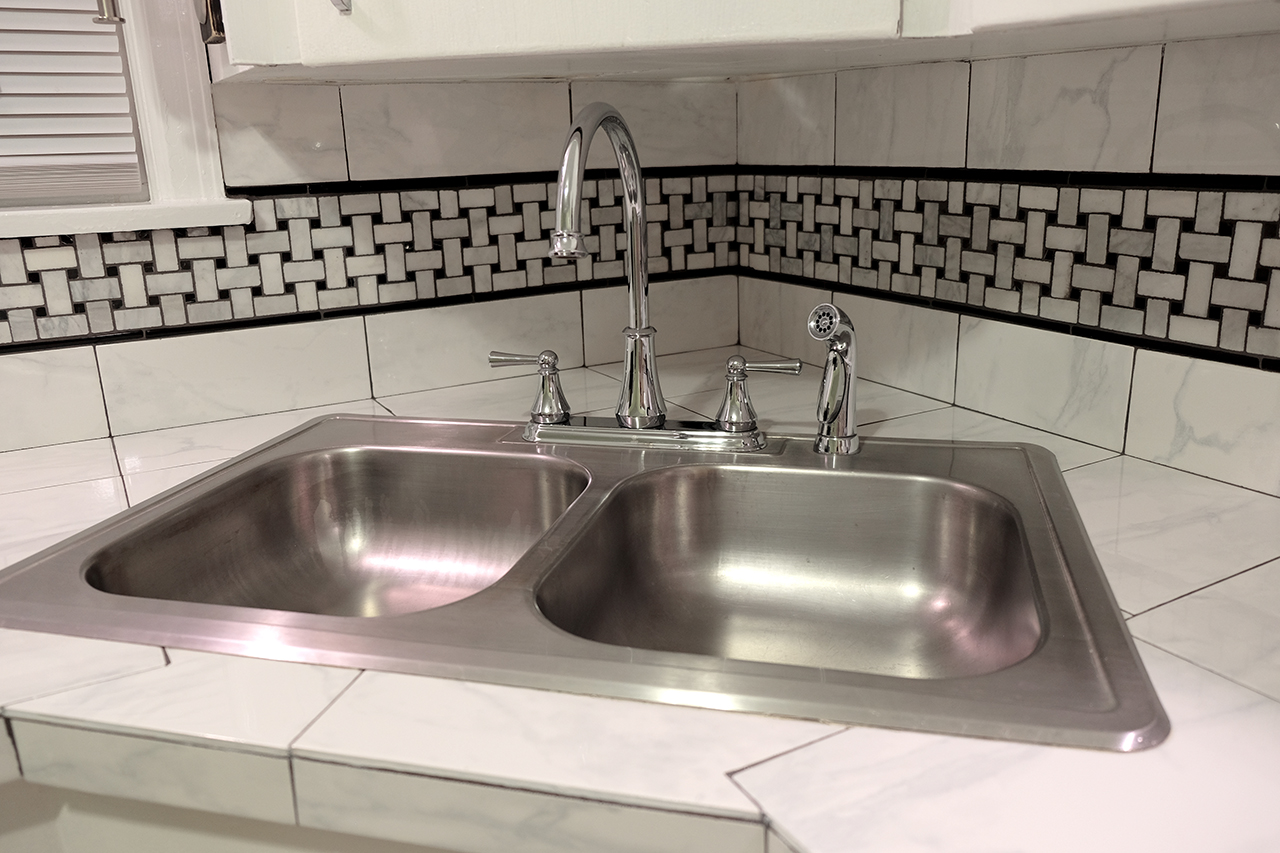 East kitchen sink detail - 102 South Kings Rent House